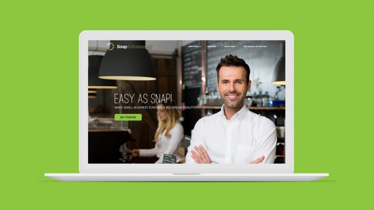 Snap Advances website homepage on laptop screen