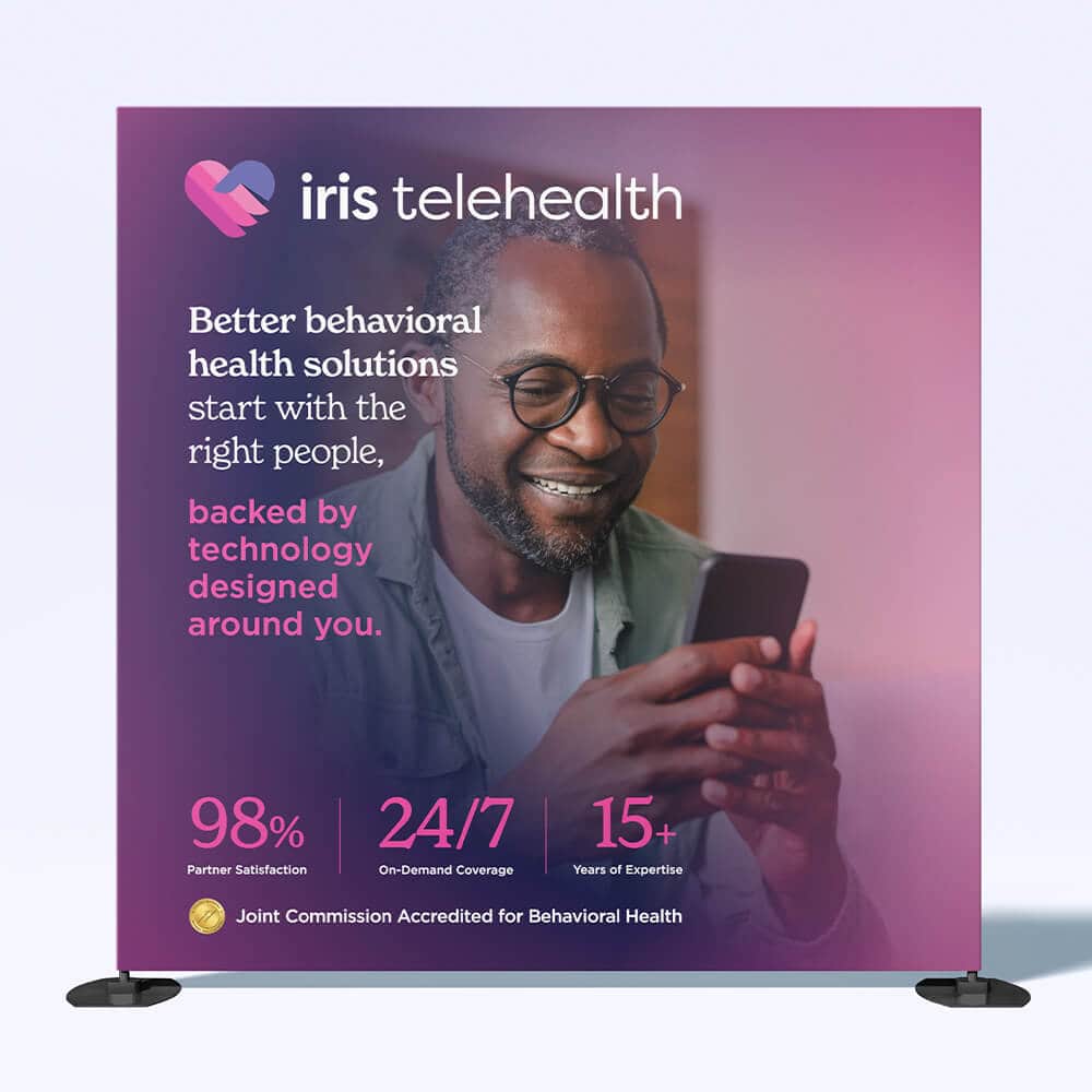 Iris Telehealth poster: smiling man using a smartphone against a purple gradient; highlights 98% satisfaction, 24/7 coverage, 15+ years of expertise.