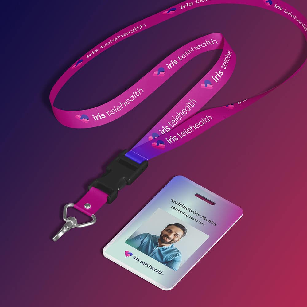 ID badge on a pink-purple iris telehealth lanyard featuring a photo of a smiling man.
